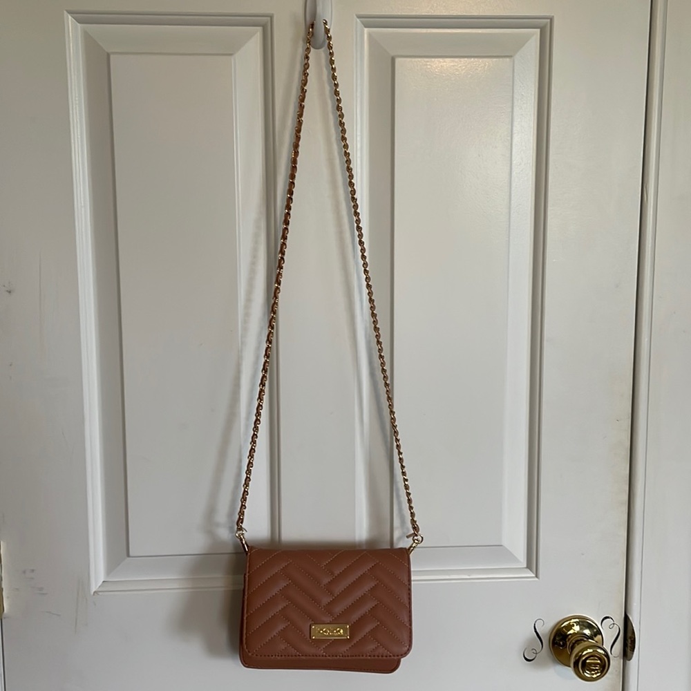 bebe crossbody clutch NEVER WORN